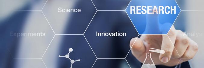 Digital screen with man in the background touching the search button